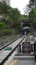 Peak Tram under the Magazine Gap Road bridge 