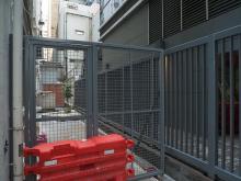 Boundary wall replaced by a fence, One Causeway Bay