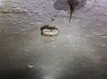 Porcelain cleat insulator on the vaulted ceiling
