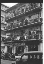 Laundry Day in Kowloon Over Paint Spraying Company, circa 1964