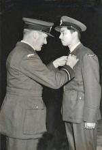 Plt Off Gordon Randall receives his Wings from Air Cdre S E Faber