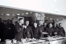 Officers serving meal b