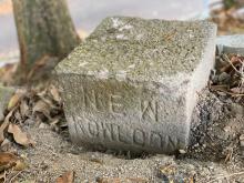 Caldecott road NK/NT boundary stone