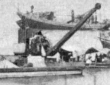 Steam crane on barge