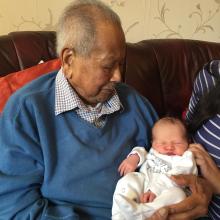 With his newest great grandchild 
