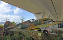 Curtis P40 fighter replica under flyover at Kwun Tong