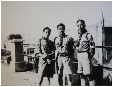 15HKG Scouts posing in front of building