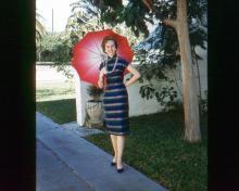 scanned mom mary K carroll nee roberts in Suzie Wong dress in hong kong island 1961.jpg